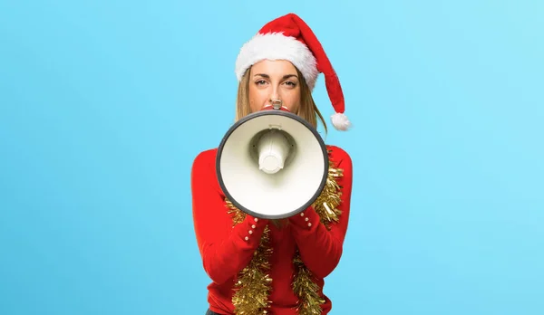 Blonde Woman Dressed Christmas Holidays Holding Megaphone Blue Background — Stock Photo, Image