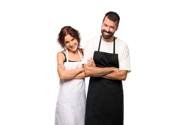 Δυο Μαγείρους Κρατώντας Χέρια Σταυρωμένα Ενώ Χαμογελά Απομονωμένες Άσπρο Φόντο — Φωτογραφία Αρχείου