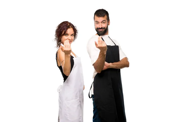 Couple Cooks Presenting Inviting Come Hand Isolated White Background — Stock Photo, Image