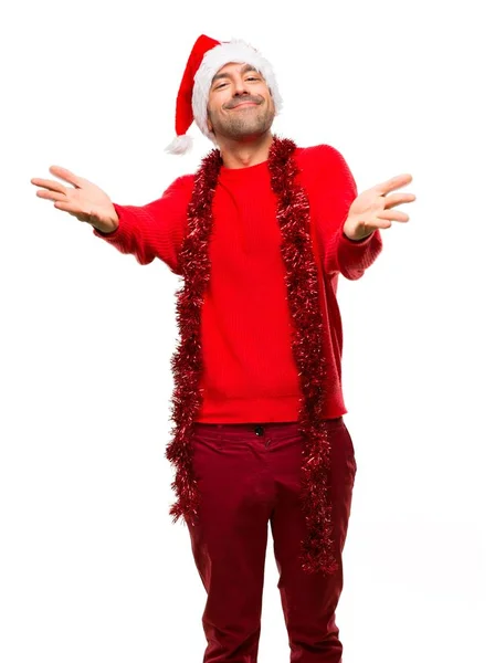 Man Red Clothes Celebrating Christmas Holidays Presenting Inviting Come Hand — Stock Photo, Image