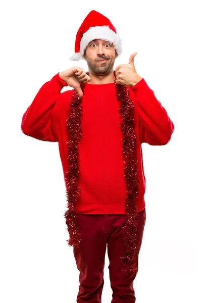 Man Red Clothes Celebrating Christmas Holidays Making Good Bad Sign — Stock Photo, Image