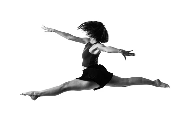 Jovencita Bailando Saltando Estudio Sobre Fondo Aislado Blanco Negro —  Fotos de Stock