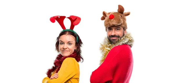Paar Verkleidet Für Die Weihnachtsfeiertage Blick Über Die Schulter Mit — Stockfoto