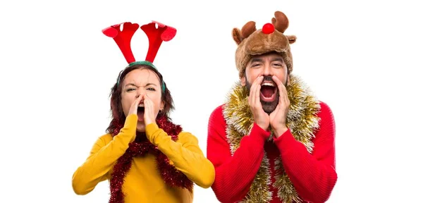 Couple Dressed Christmas Holidays Shouting Mouth Wide Open Announcing Something — Stock Photo, Image