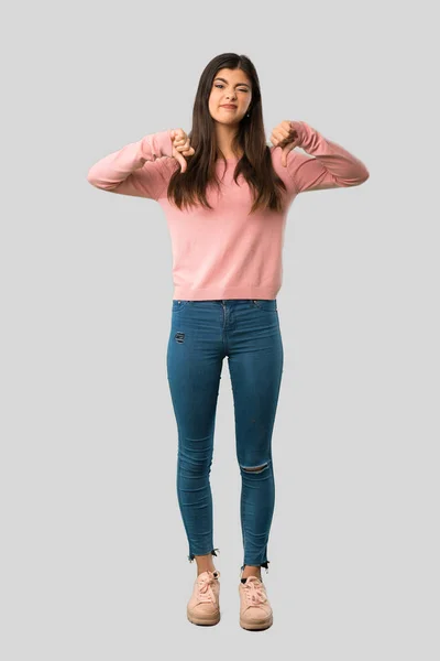 Full Body Teenager Girl Pink Shirt Showing Thumb Both Hands — Stock Photo, Image