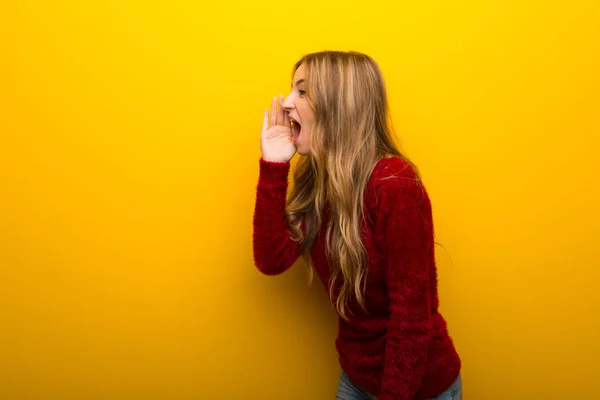 Young Girl Vibrant Yellow Background Shouting Mouth Wide Open Lateral — Stock Photo, Image