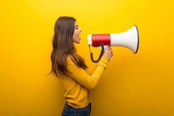 Teenager Girl Vibrant Yellow Background Shouting Megaphone Announce Something Lateral — Stock Photo, Image