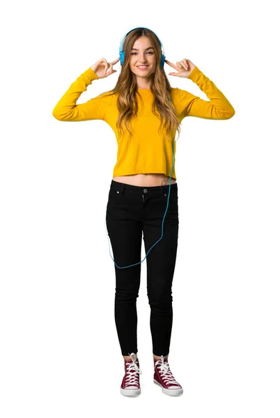 Eine Ganzkörperaufnahme Eines Jungen Mädchens Mit Gelbem Pullover Das Musik — Stockfoto