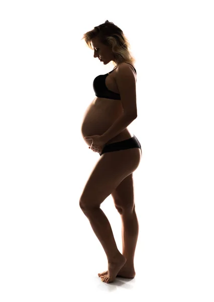 Sanatsal Izole Arka Plan Üzerinde Sarışın Hamile Kadın Silüeti — Stok fotoğraf