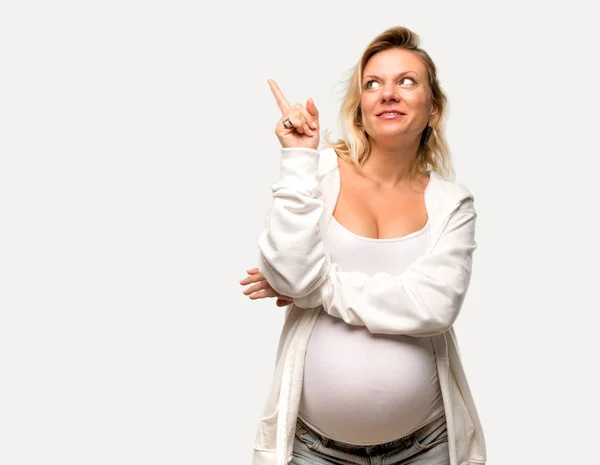 Schwangere Blonde Frau Mit Weißem Sweatshirt Die Mit Dem Zeigefinger — Stockfoto