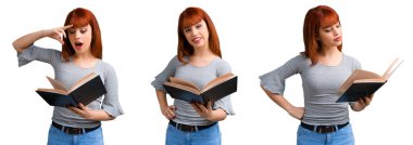 Holding ve bir kitap okuma genç Kızıl saçlı kız kümesi