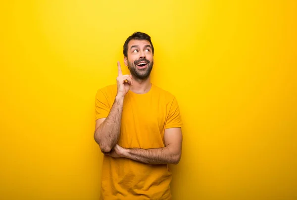 Man Isolated Vibrant Yellow Color Thinking Idea Pointing Finger — Stock Photo, Image