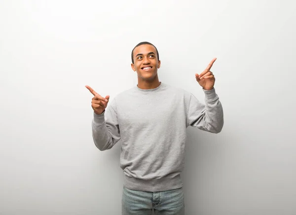 African American Man White Wall Background Pointing Index Finger Great — Stock Photo, Image