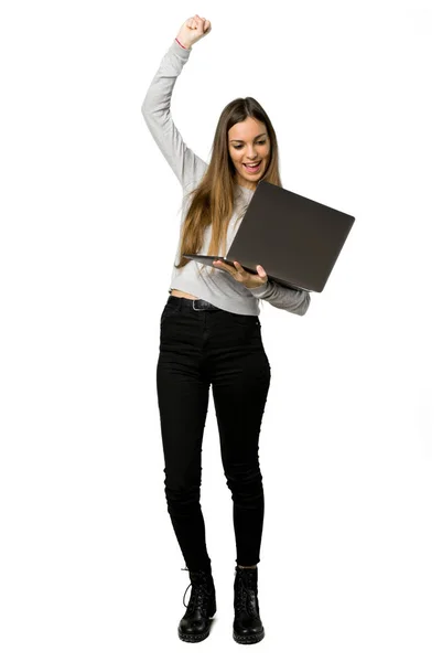 Full Length Shot Young Girl Laptop Celebrating Victory Isolated White — Stock Photo, Image