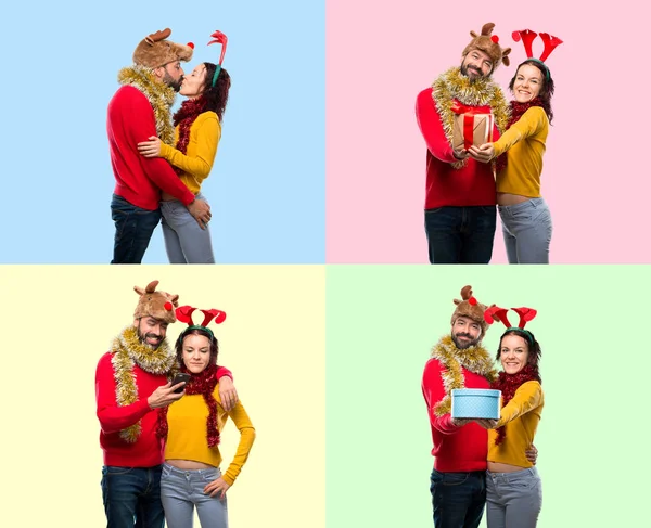 Set Paar Verkleed Voor Kerstvakantie Zoenen Met Gift Kleurrijke Achtergrond — Stockfoto
