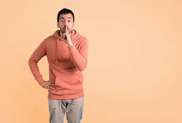 Man Pink Sweatshirt Showing Sign Closing Mouth Silence Gesture Putting — Stock Photo, Image