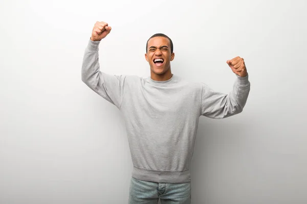 African American Man White Wall Background Celebrating Victory Winner Position — Stock Photo, Image