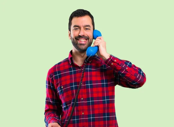 Handsome Man Talking Vintage Phone Green Background — Stock Photo, Image