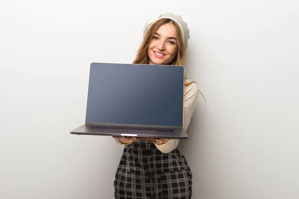 Fashionably Woman Wearing Hat Showing Laptop — Stock Photo, Image