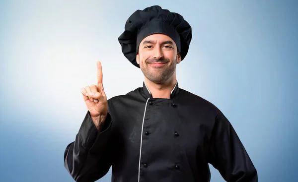 Chef Hombre Uniforme Negro Mostrando Levantando Dedo Señal Mejor Sobre — Foto de Stock