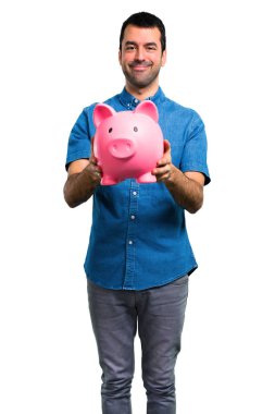 Bir servet tutan mavi gömlek ile yakışıklı adam