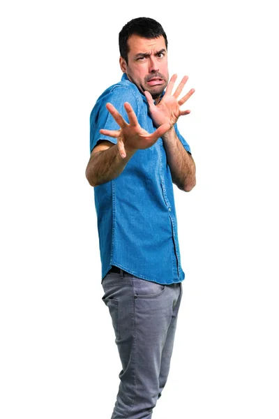 Hombre Guapo Con Camisa Azul Poco Nervioso Asustado —  Fotos de Stock