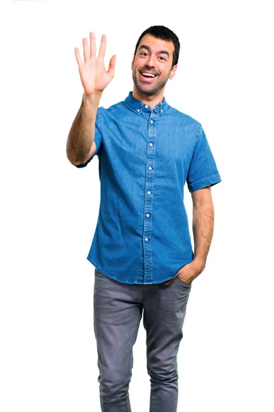 Mavi Gömlek Selamlayan Ile Yakışıklı Adam — Stok fotoğraf