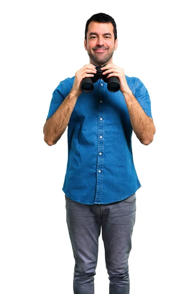 Knappe Man Met Een Blauw Shirt Met Een Verrekijker — Stockfoto