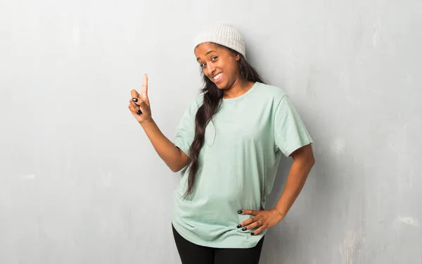 Young Afro American Woman Textured Background Showing Lifting Finger Sign — Stock Photo, Image