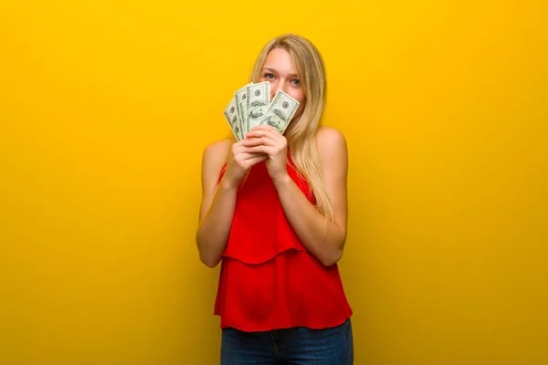 Young Girl Red Dress Yellow Wall Taking Lot Money — Stock Photo, Image