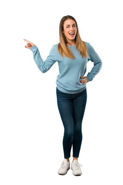 Full Body Blonde Woman Blue Shirt Pointing Finger Side Presenting — Stock Photo, Image