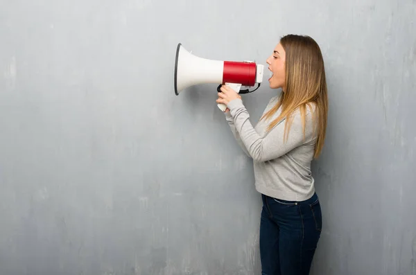 Young Woman Textured Wall Shouting Megaphone Announce Something Lateral Position — Stock Photo, Image