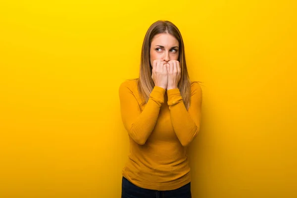 Young Woman Yellow Background Little Bit Nervous Scared Putting Hands — Stock Photo, Image