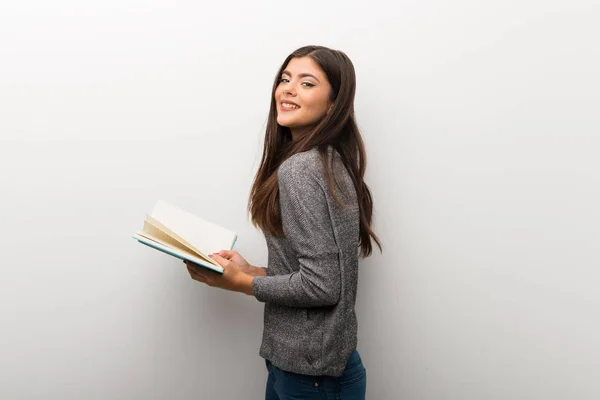 Teenager Mädchen Auf Isoliertem Weißen Rücken Hält Ein Buch Der — Stockfoto