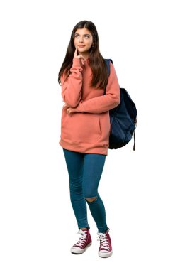 Kazak ve ararken bir fikir düşünce sırt çantası bir genç kızla tam uzunlukta bir kadeh