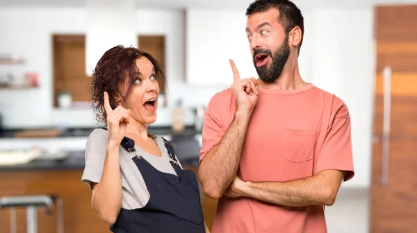 Couple Pregnant Woman Intending Realizes Solution While Lifting Finger House — Stock Photo, Image