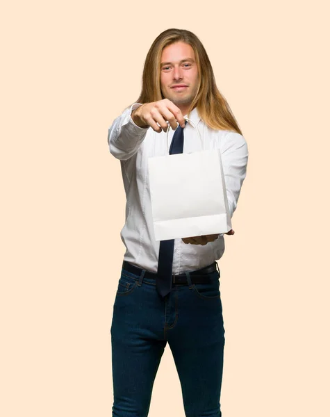 Blond Businessman Long Hair Holding Lot Shopping Bags Isolated Background — Stock Photo, Image