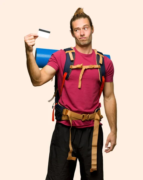 Hiker Man Mountain Backpacker Taking Credit Card Money Isolated Background — Stock Photo, Image