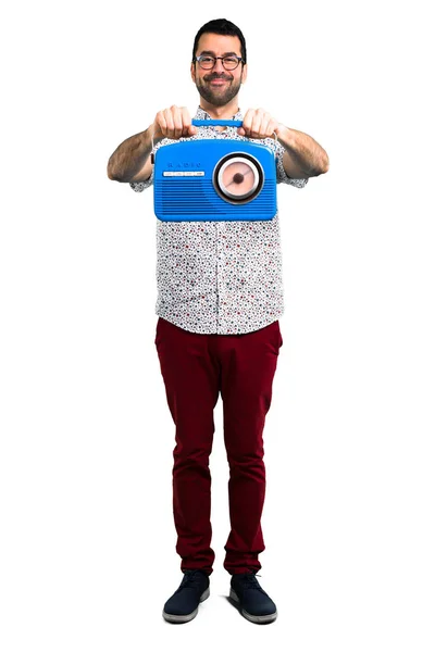 Hombre Guapo Con Gafas Sosteniendo Una Radio —  Fotos de Stock