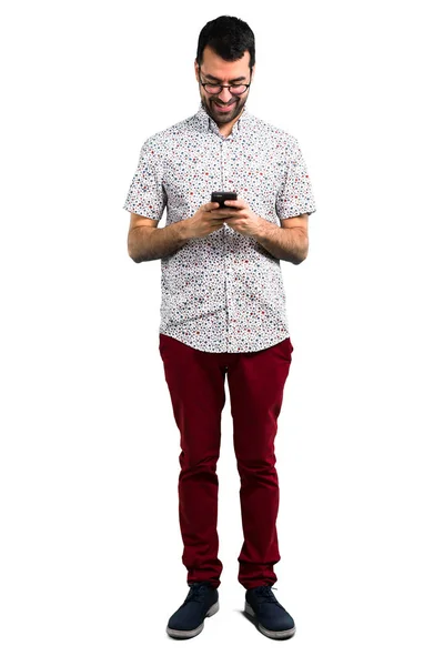 Hombre Guapo Con Gafas Hablando Con Móvil —  Fotos de Stock