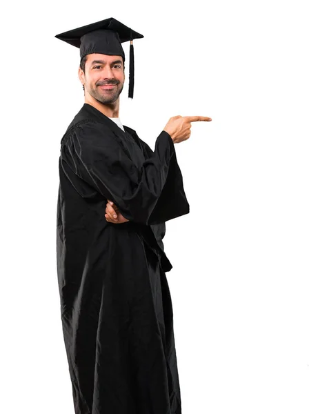 Hombre Día Graduación Universidad Señalando Dedo Hacia Lado Presentando Producto — Foto de Stock