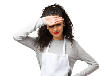 Young girl with apron with tired and sick expressionon white background