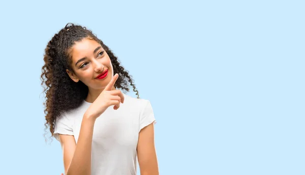 Young Girl Curly Hair Pointing Index Finger Great Idea Looking — Stockfoto