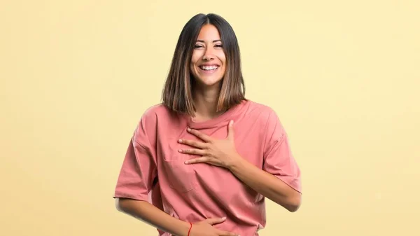 Young Girl Pink Shirt Smiling Lot While Putting Hands Chest — Zdjęcie stockowe