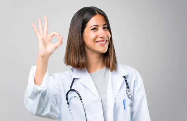 Doctor Woman Stethoscope Showing Sign Fingers Face Happiness Satisfaction Grey — Stockfoto