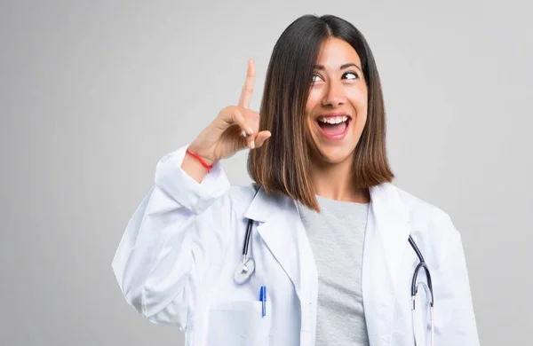 Doctor Woman Stethoscope Intending Realizes Solution While Lifting Finger Grey — Stock Photo, Image