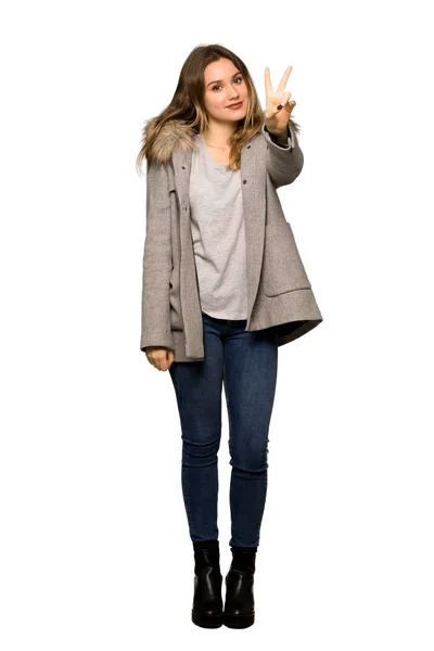 Full Length Shot Teenager Girl Coat Smiling Showing Victory Sign — Stock Photo, Image