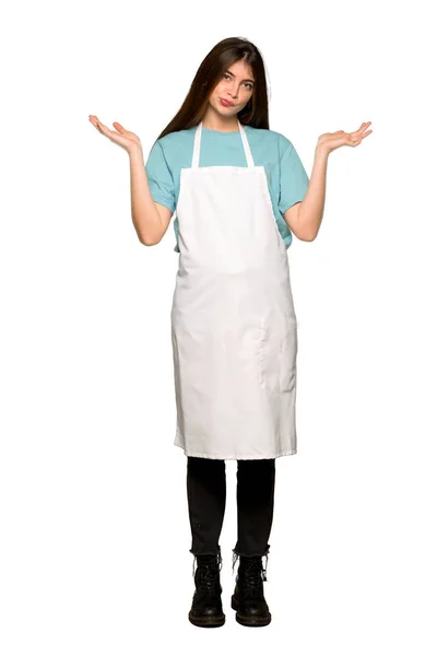 Full Length Shot Girl Apron Having Doubts While Raising Hands — Φωτογραφία Αρχείου