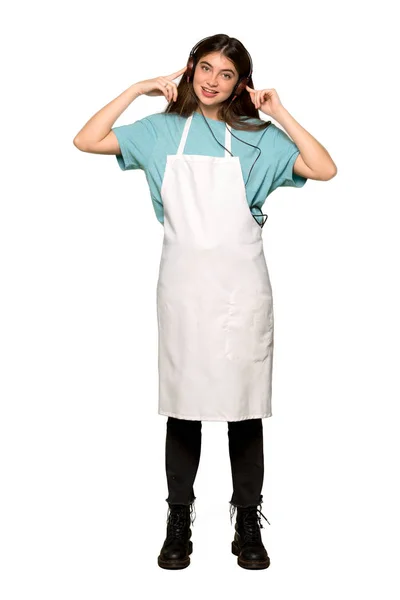 Full Length Shot Girl Apron Listening Music Headphones Isolated White — Stock Photo, Image