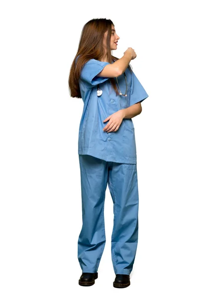 Full Length Shot Young Nurse Pointing Back Index Finger Isolated — Stock Photo, Image